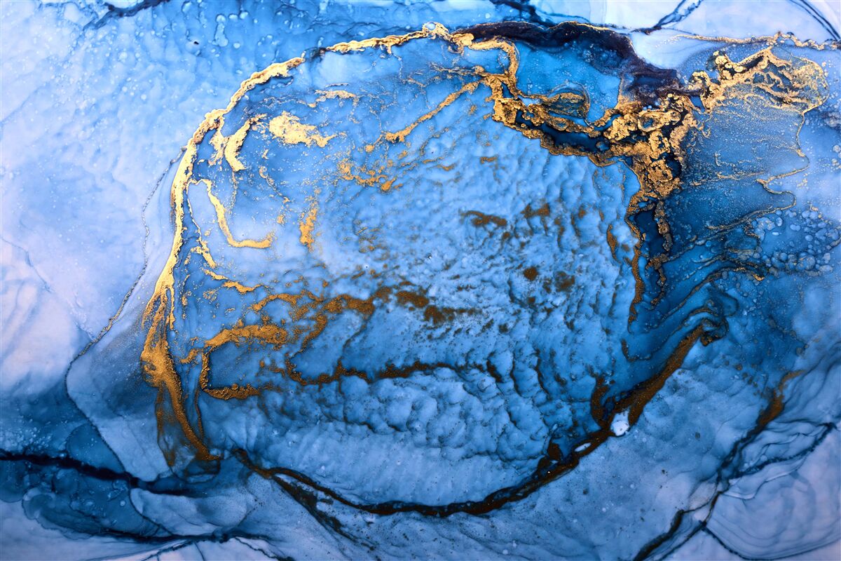 Carta da parati macchie d'oro su un mare blu
