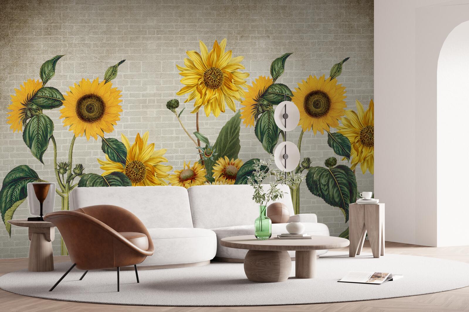 Carta da parati Muro di mattoni con girasoli in primo piano