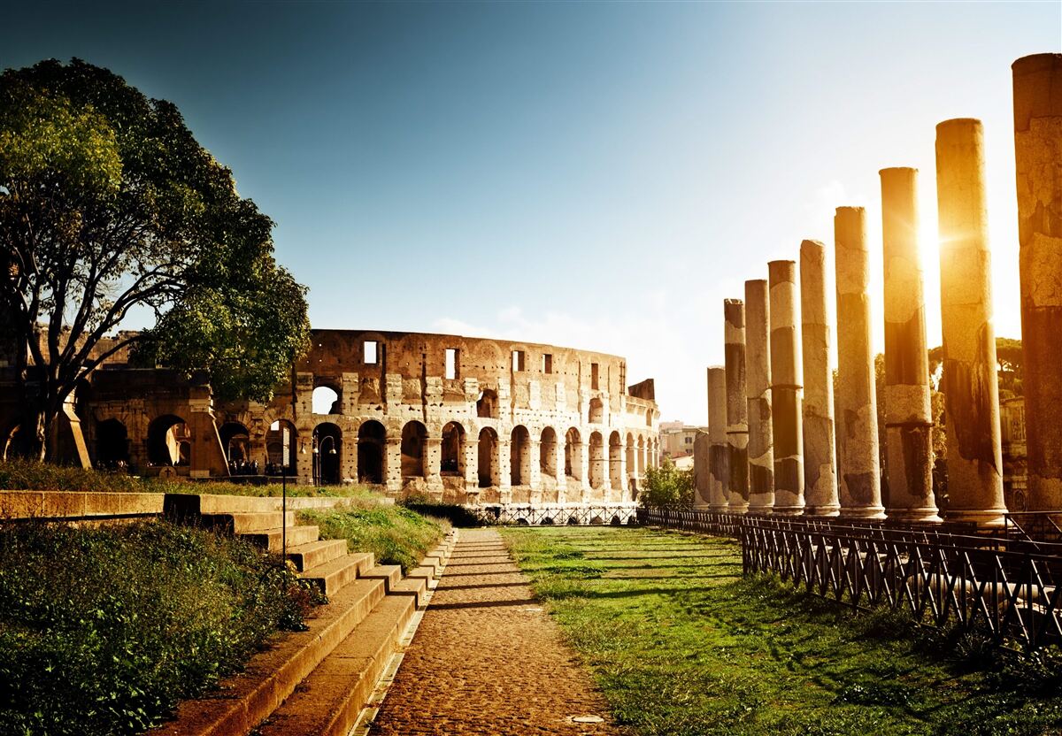 Carta da parati tramonto al colosseo romano