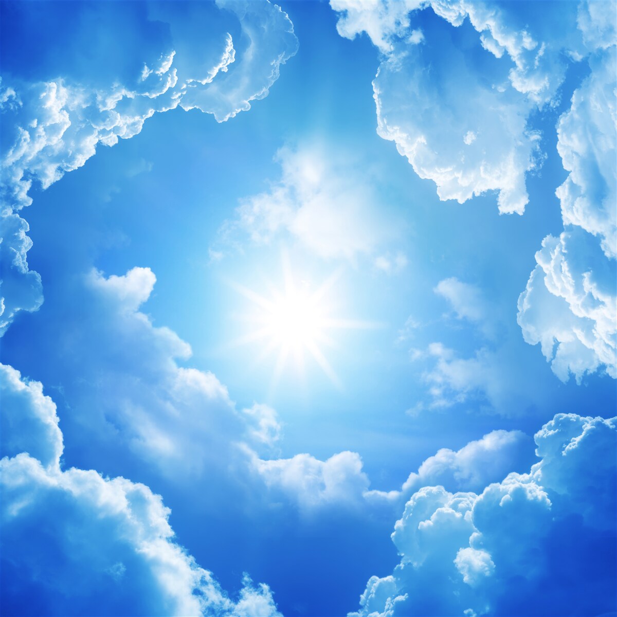 Carta da parati nuvole e sole