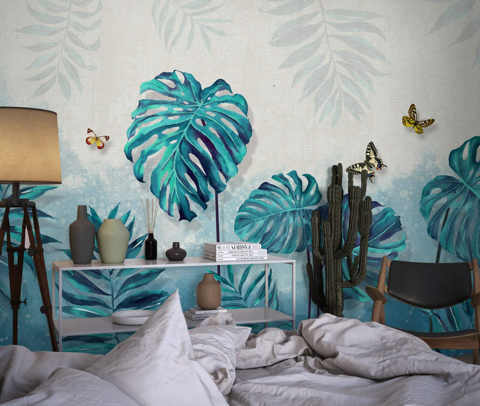 Carta da parati le foglie della monstera sono blu, decorate con farfalle